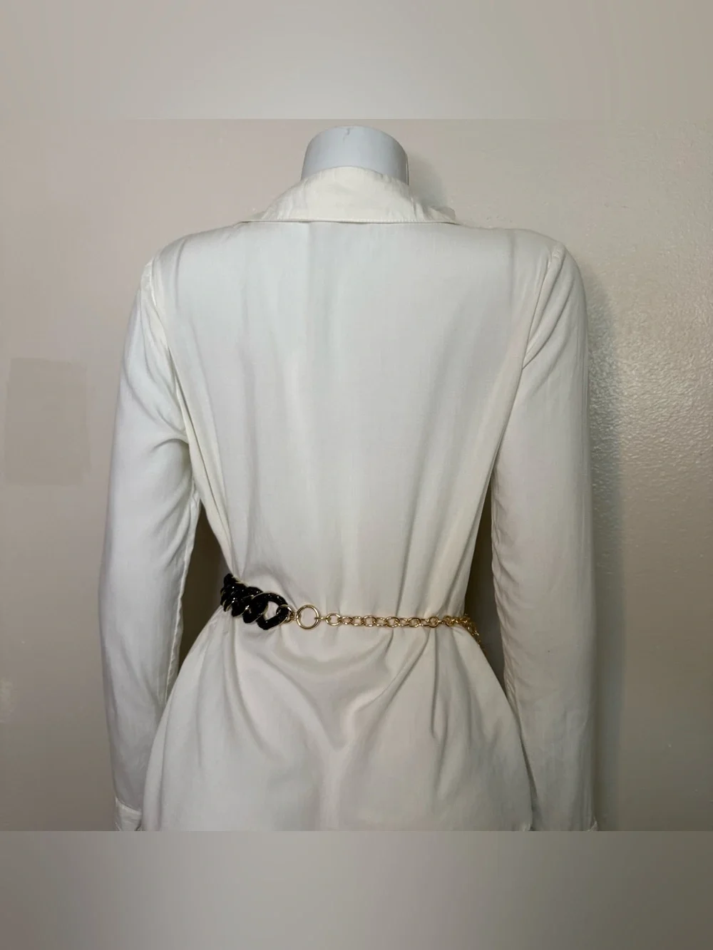 Gold tone metal chain belt with black plastic links